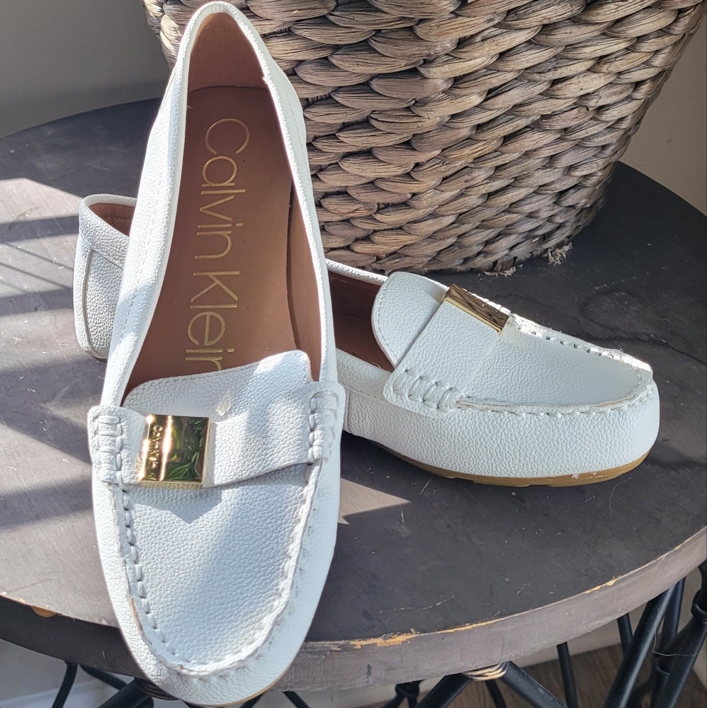 Calvin Klein loafers New Cond  Lightly worn 1 time. White with gold hardware.